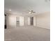 Open living room with access to closets at 19061 N Toya St, Maricopa, AZ 85138