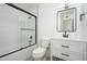 Modern bathroom features a tiled shower, new fixtures, and vanity with drawers at 1909 N 74Th St, Scottsdale, AZ 85257