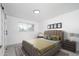 Serene bedroom featuring a stylish bed with a tufted headboard and minimalist artwork at 1909 N 74Th St, Scottsdale, AZ 85257