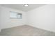 Cozy bedroom with gray tile floors, a window and light at 1909 N 74Th St, Scottsdale, AZ 85257