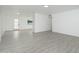 Bright and airy living room featuring modern light grey tile flooring and neutral white paint at 1909 N 74Th St, Scottsdale, AZ 85257