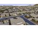 An aerial view of a suburban neighborhood with mountains in the background at 19746 N Heron Ct, Maricopa, AZ 85138