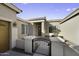 A gated courtyard entrance to a well-maintained single-Gathering home at 19746 N Heron Ct, Maricopa, AZ 85138