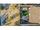 Aerial view of home showing backyard space featuring a fire pit and outdoor dining area at 2124 N 89Th Pl, Mesa, AZ 85207