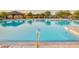 Community pool offers sparkling water, covered seating areas and relaxing desert scenery at 2124 N 89Th Pl, Mesa, AZ 85207