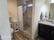 Remodeled bathroom showcasing a tiled walk-in shower and modern vanity at 2710 S Noche De Paz --, Mesa, AZ 85202