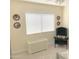 Bedroom featuring neutral carpet, a window and a decorative storage chest at 2710 S Noche De Paz --, Mesa, AZ 85202