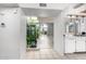 Inviting entryway with neutral tile flooring leads to the bright and airy living spaces at 2714 W Desert Cove Ave, Phoenix, AZ 85029