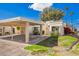 Charming single-story home featuring a covered carport and well-maintained landscaping in a desirable neighborhood at 2714 W Desert Cove Ave, Phoenix, AZ 85029
