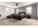Spacious bedroom featuring plush carpet, neutral walls, and a ceiling fan at 284 N 199Th Dr, Buckeye, AZ 85326