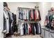 Walk-in closet providing generous storage with double hanging rods and shelving at 284 N 199Th Dr, Buckeye, AZ 85326