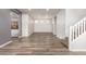 Open floor plan featuring modern floors and neutral color scheme at 284 N 199Th Dr, Buckeye, AZ 85326