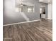 Spacious living room featuring modern floors and abundant natural light at 284 N 199Th Dr, Buckeye, AZ 85326