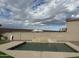 Beautiful backyard swimming pool with a soothing water feature at 284 N 199Th Dr, Buckeye, AZ 85326