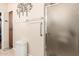 Bathroom featuring a glass shower, a linen closet, a towel rack, and tile floors at 2842 S Royal Wood --, Mesa, AZ 85212
