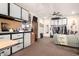 Large bonus room with carpet, a day bed and overhead cabinets for storage at 2842 S Royal Wood --, Mesa, AZ 85212