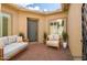 Inviting private courtyard with outdoor seating, offering a relaxing space for residents and guests at 32297 N 133Rd Ln, Peoria, AZ 85383