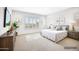 Serene main bedroom showcasing soft colors, plantation shutters, and tasteful decor for relaxation at 32297 N 133Rd Ln, Peoria, AZ 85383