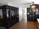Bonus room with dark cabinets and tile flooring at 39837 N Manetti St, San Tan Valley, AZ 85140