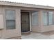 View of the front door with security screen and a small porch area at 39837 N Manetti St, San Tan Valley, AZ 85140