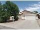 Charming single-story home with a two-car garage and mature landscaping in a well-maintained neighborhood at 39837 N Manetti St, San Tan Valley, AZ 85140
