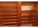 Wooden shelving in open cabinetry for maximum storage and organization at 39837 N Manetti St, San Tan Valley, AZ 85140