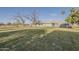 Expansive backyard featuring a well-maintained lawn, providing outdoor enjoyment at 40192 N Taylor St, San Tan Valley, AZ 85140