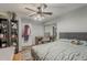 Bedroom featuring a comfortable bed with bedside furniture and a ceiling fan at 40192 N Taylor St, San Tan Valley, AZ 85140
