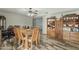 Comfortable dining area with wood-look floors and wooden furniture at 40192 N Taylor St, San Tan Valley, AZ 85140