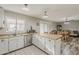 Bright kitchen with stainless steel appliances and an island counter with wood surface at 40192 N Taylor St, San Tan Valley, AZ 85140