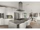 Spacious open kitchen with stainless steel appliances and a view into the breakfast nook at 40198 N 105Th Pl, Scottsdale, AZ 85262