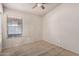 Comfortable bedroom featuring neutral-colored walls and natural light at 41848 W Michaels Dr, Maricopa, AZ 85138
