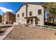 Inviting two-story home with a charming facade and well-manicured front yard at 419 N Alder St, Gilbert, AZ 85233