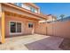 The backyard features a large covered patio and concrete at 4625 W Thomas Rd # 19, Phoenix, AZ 85031
