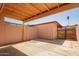 This backyard features a covered patio and concrete at 4625 W Thomas Rd # 19, Phoenix, AZ 85031