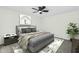 Cozy bedroom featuring neutral décor, carpet, ceiling fan, and comfortable modern furnishings at 4743 W Laurel Ln, Glendale, AZ 85304