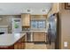 Well-lit kitchen featuring stainless steel appliances, ample counter space, and natural light at 4918 W Butler Dr, Chandler, AZ 85226