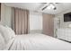 Bedroom featuring soft colors, a ceiling fan, and ample natural light at 5016 N 68Th Dr, Glendale, AZ 85303