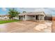 Single-story home featuring a low maintenance front yard and a convenient covered carport at 5016 N 68Th Dr, Glendale, AZ 85303