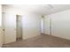 Bedroom with neutral carpet and built-in closets at 5133 W Hearn Rd, Glendale, AZ 85306