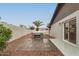 Backyard patio area features a built-in BBQ and ample space for outdoor entertaining at 5561 W Greenbriar Dr, Glendale, AZ 85308