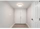 Bright entryway with double doors, recessed lighting, and neutral walls creates a welcoming entrance to the home at 5561 W Greenbriar Dr, Glendale, AZ 85308