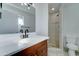 Updated bathroom with a modern vanity, large mirror, and a walk-in shower with neutral tiling at 623 N Parsell --, Mesa, AZ 85203
