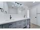 Bright bathroom with dual sink vanity, large mirror, and modern fixtures at 623 N Parsell --, Mesa, AZ 85203