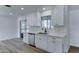Modern kitchen featuring white cabinets, sleek countertops, and stainless steel appliances at 623 N Parsell --, Mesa, AZ 85203