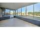 Enclosed patio featuring concrete floors and walls of windows overlooking the backyard and pool at 623 N Parsell --, Mesa, AZ 85203