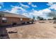 Backyard featuring desert landscaping, play structure and a private pool, perfect for outdoor activities at 6922 S 26Th Ln, Phoenix, AZ 85041