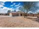 Charming single-story home featuring low-maintenance desert landscaping and an attached two-car garage at 6922 S 26Th Ln, Phoenix, AZ 85041