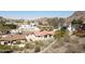 An exterior view of home with a desert landscape with stunning mountain views at 7532 N 23Rd St, Phoenix, AZ 85020