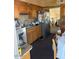 A functional kitchen with stainless steel appliances and wood cabinets at 7532 N 23Rd St, Phoenix, AZ 85020